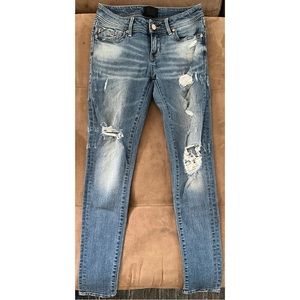 Buckle Black Distressed Jeans